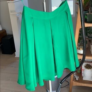 Green pleated flare skirt